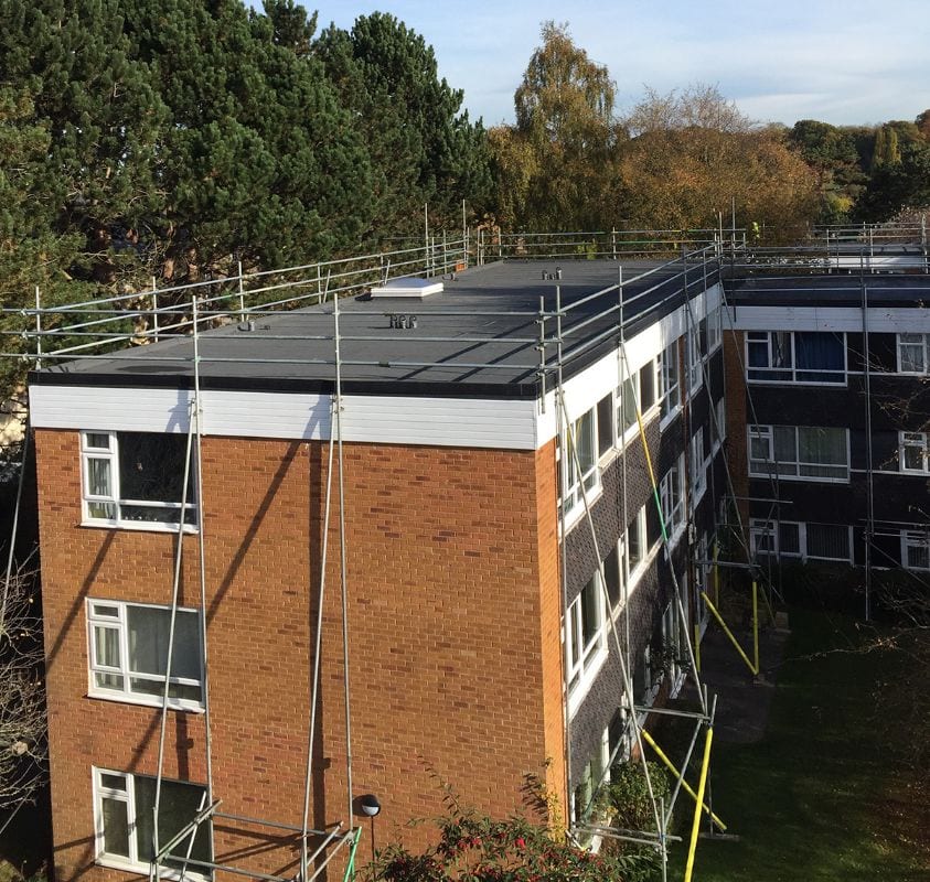Reinforced bituminous membrane roof completed above the occupied apartments at Tiffany Court