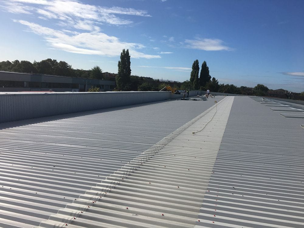 Refurbished roof covering across a parade of retail units